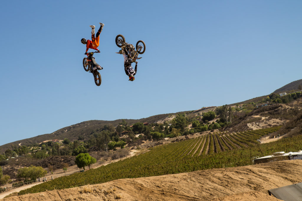 Jimmy checking the tire pressure of his buddy upside down - Fitzland USA